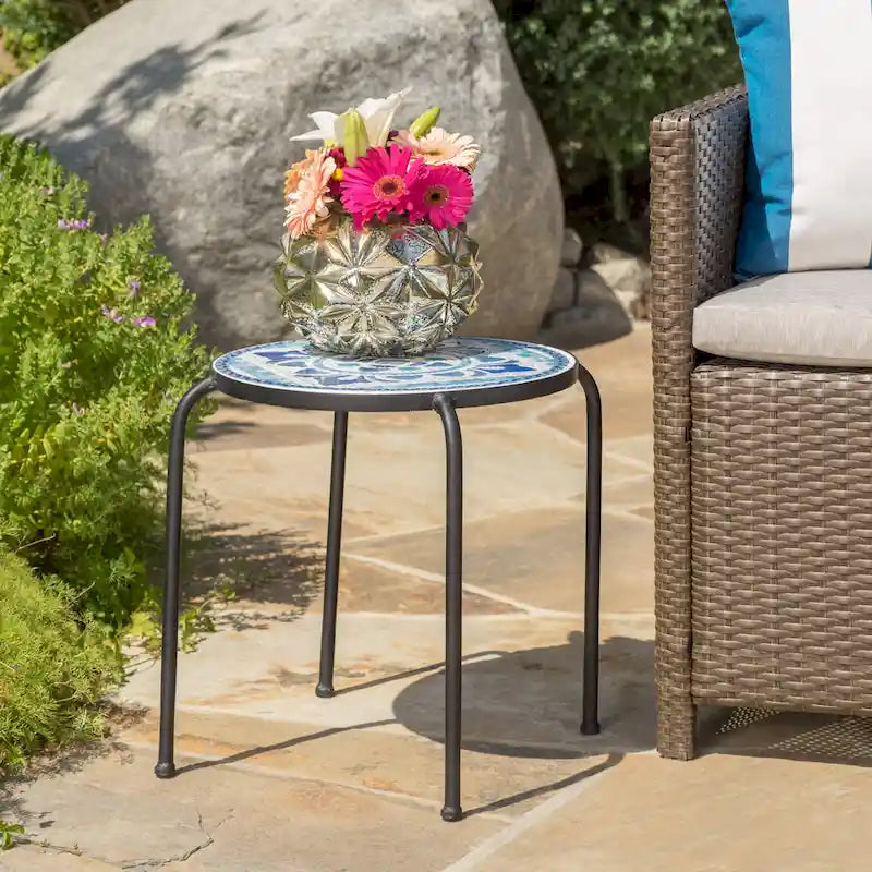 Charming Outdoor Side Table with Artistic Appeal and Practical Functionality