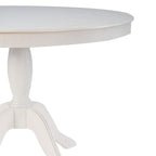 Table ronde à pied central en bois massif
