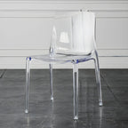Chaise de salle à manger sans accoudoirs à dossier bas en acrylique ambre