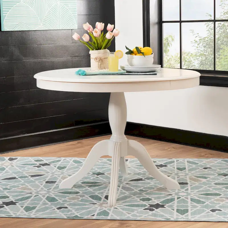 Table ronde à pied central en bois massif