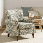 Fauteuil en bois traditionnel Araceli, rembourré à motifs floraux, avec dossier à oreilles et garniture cloutée | ART OF LIVING DESIGNS