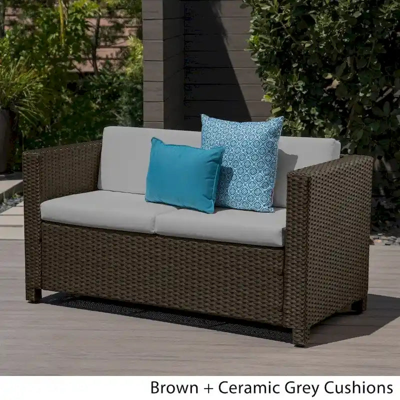 Causeuse d'extérieur en osier Puerta avec coussin par Christopher Knight Home