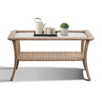 Table basse d'extérieur en osier avec plateau en verre