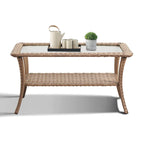 Table basse d'extérieur en osier avec plateau en verre