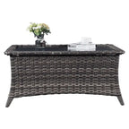 Table basse d'extérieur en osier avec plateau en verre et rotin
