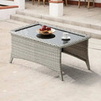 Table basse d'extérieur en osier avec plateau en verre et rotin
