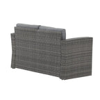 Causeuse d'extérieur en osier avec coussin