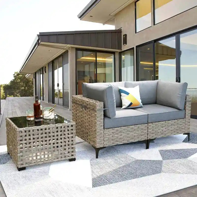 Ensemble de meubles de patio en rotin XIZZI 3 pièces avec table basse