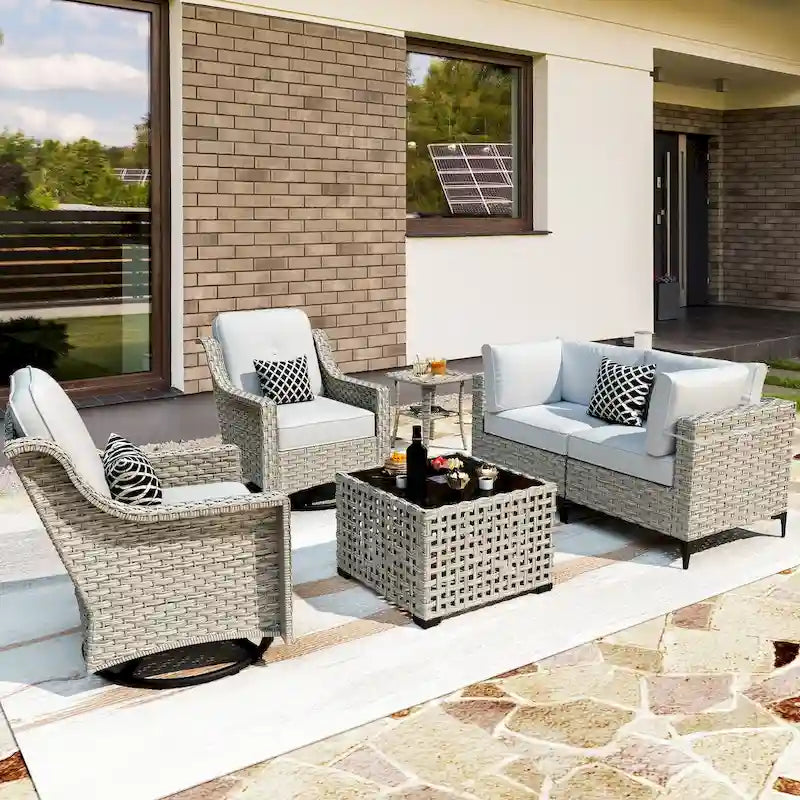 Ensemble de 6 chaises pivotantes en osier d'extérieur OVIOS avec table basse à énergie solaire