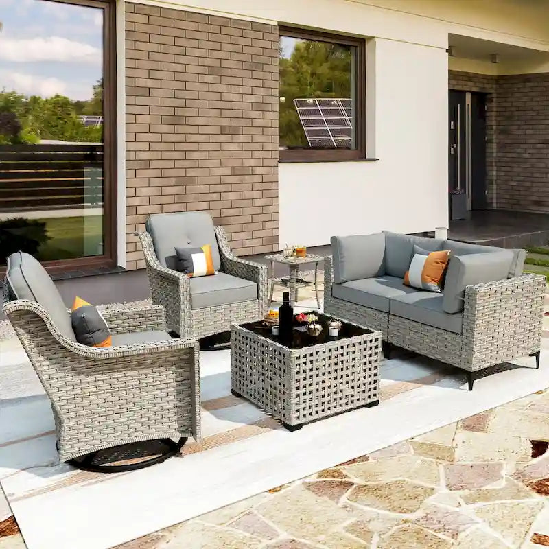Ensemble de 6 chaises pivotantes en osier d'extérieur OVIOS avec table basse à énergie solaire