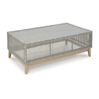 Table basse d'extérieur Yami 127 cm, résine tressée, plateau en verre trempé, gris
