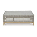 Table basse d'extérieur Yami 127 cm, résine tressée, plateau en verre trempé, gris